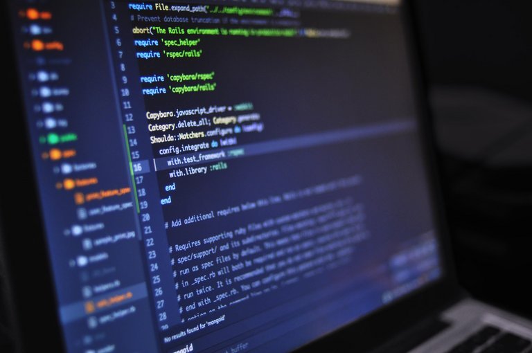 Developer workstation with code representing container and cloud-native security